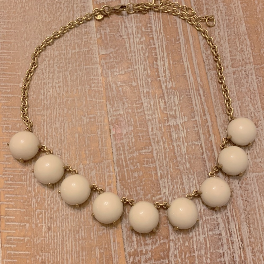 J. Crew cream baubles and gold necklace